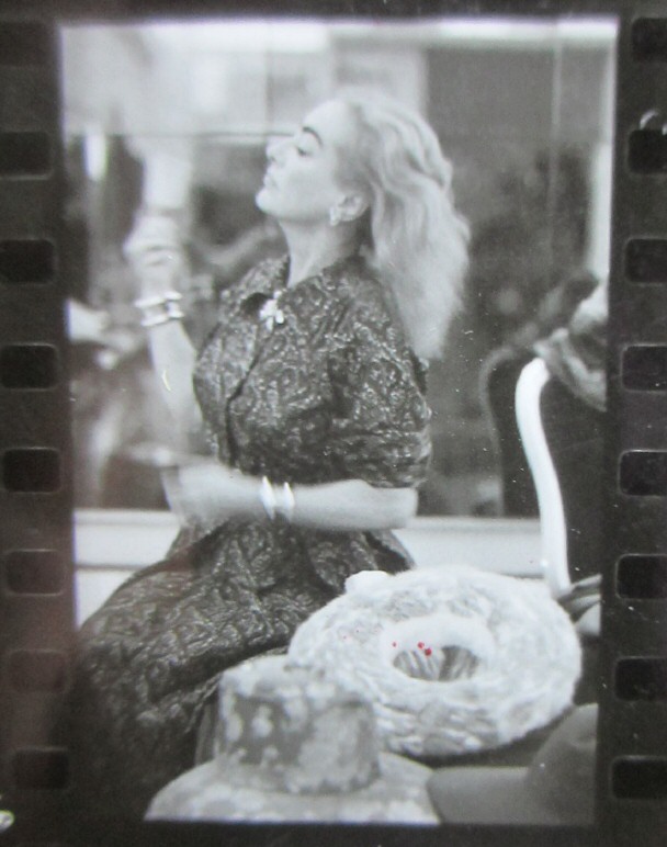 1959 by Eve Arnold. Shot at Walter Florell's millinery salon in NYC. (Thanks to James.)