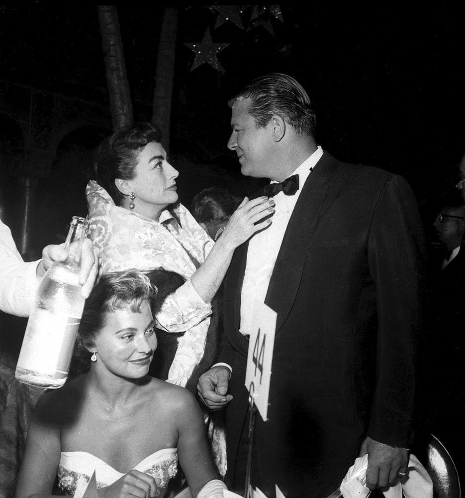 1954. At the premiere of 'A Star Is Born' with Jack Carson (and Lola Albright at bottom).