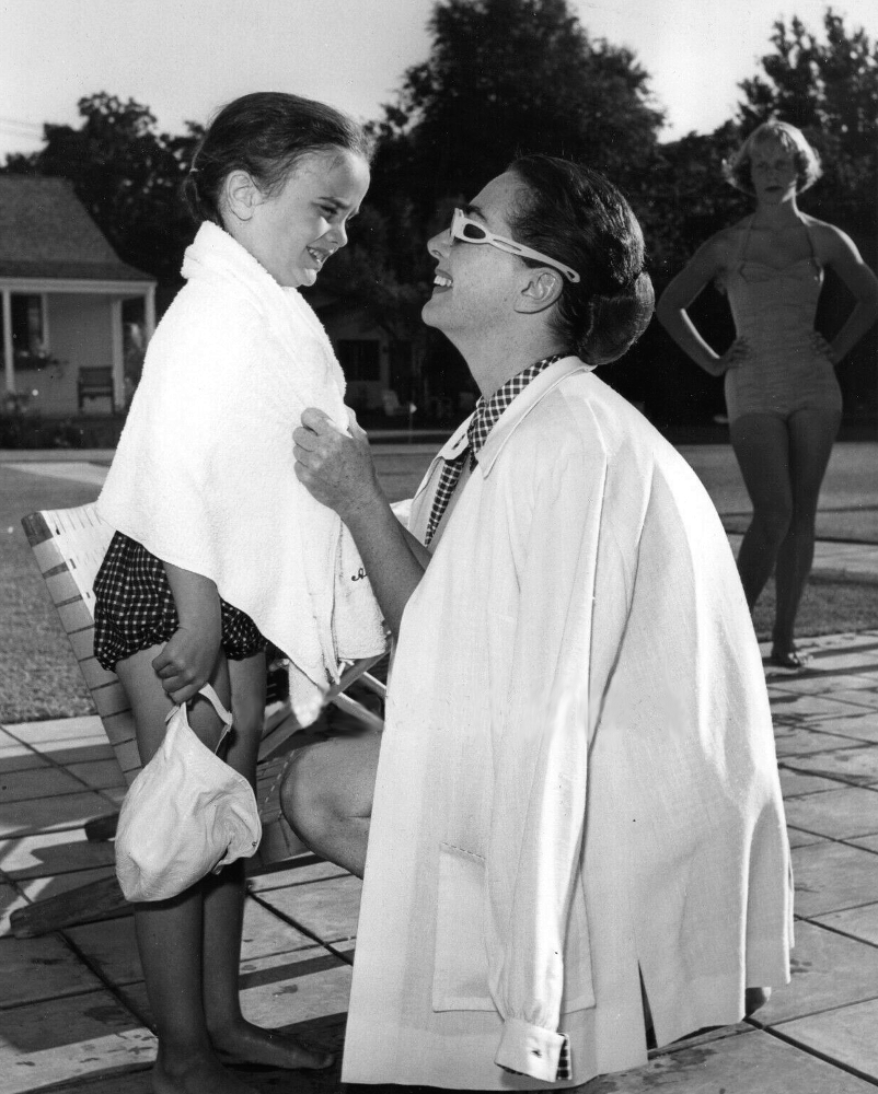 1953. With a Twin and a lurking Christina. Shot by Len Weissman.