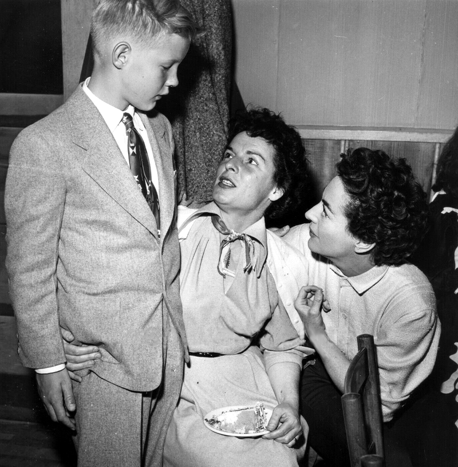 On the set of 'Johnny Guitar' with son Christopher and Mercedes McCambridge.