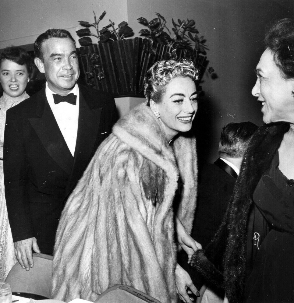 1953. At the Redbook Awards with writer Mel Dinelli.