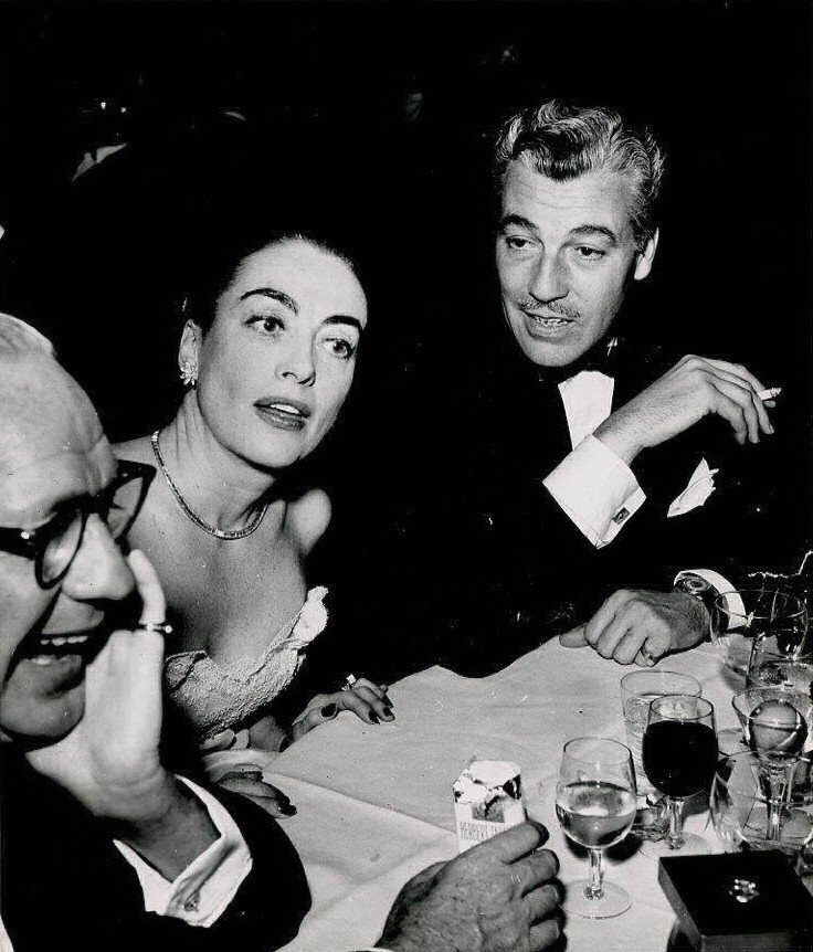 1954. With Al Steele, left, and Cesar Romero.