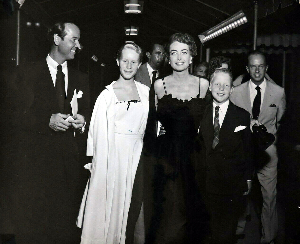 1951. With Earl Blackwell, Christina, and Christopher.