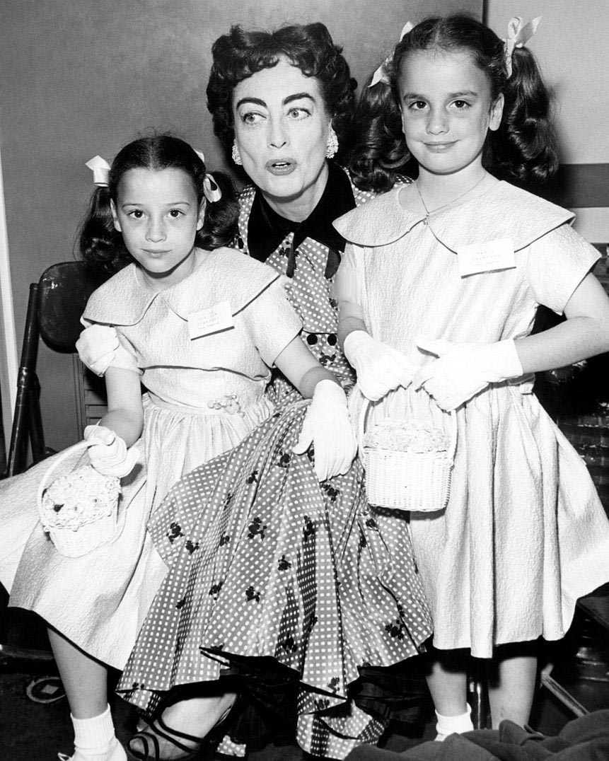 1955. With twins Cathy and Cindy.