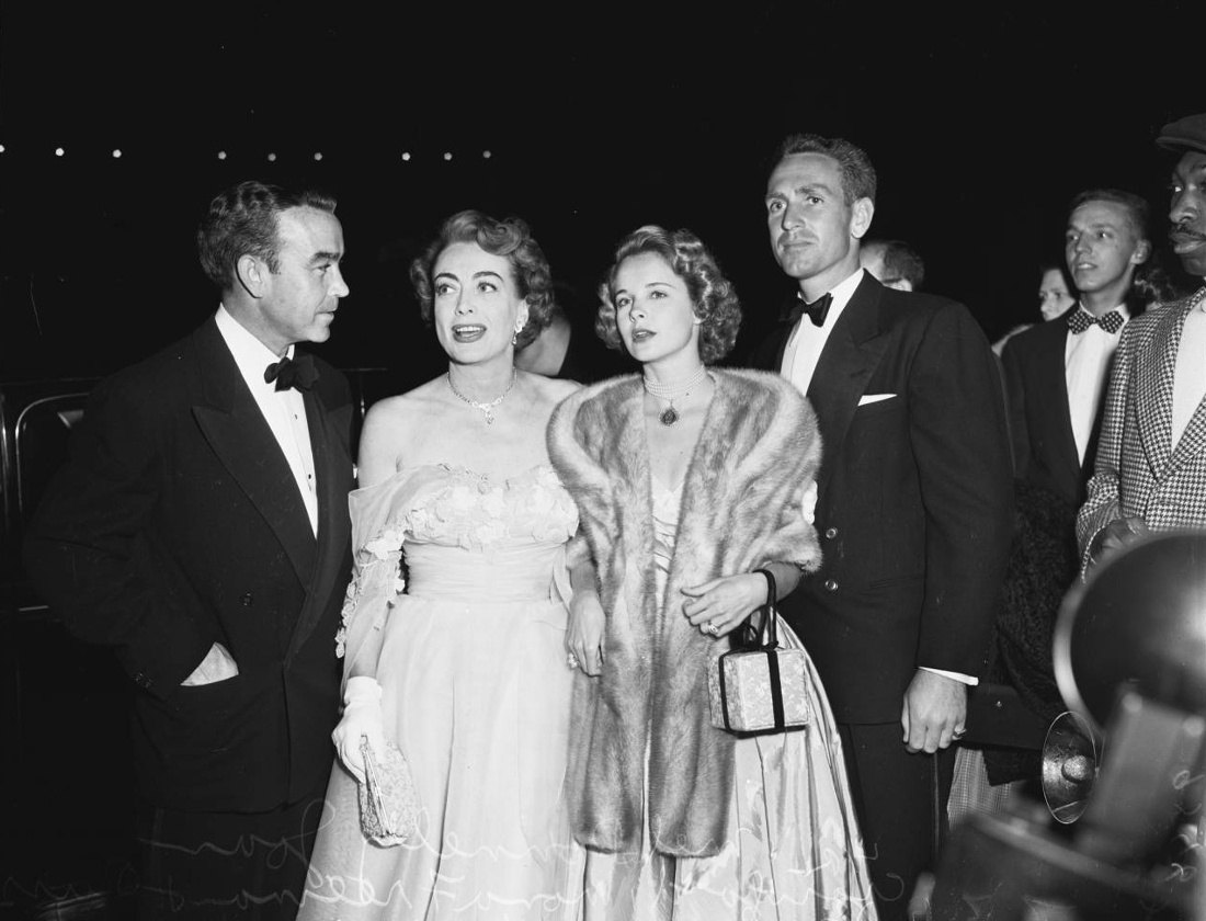 April 21, 1952. At Judy Garland's LA Philharmonic show with Mel Dinelli (left) and Mona Freeman.