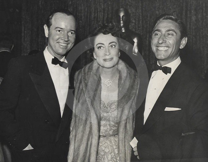 March 19, 1953, at the Pantages Theatre for the first televised Oscars. With Earl Blackwell, left, and director David Miller.