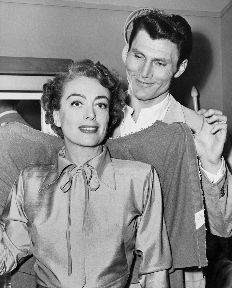 1952. On the set of 'Sudden Fear' with Jack Palance.