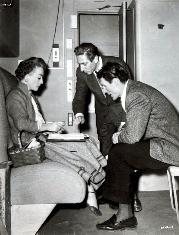 1952. On the set of 'Sudden Fear' with director Miller and Jack Palance.