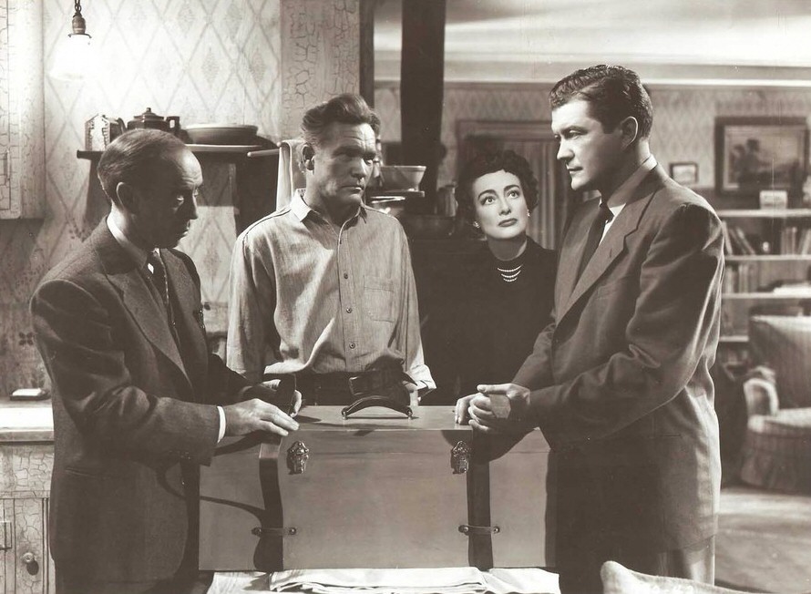1952. 'This Woman is Dangerous.' With Dennis Morgan, right.