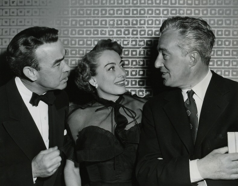 1952. With Mel Dinelli, left, and director Vittorio De Sica.