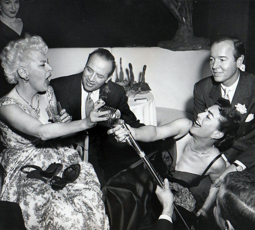 Circa 1953 with singer Gertrude Niesen, Dick Kellmar, and Earl Blackwell.