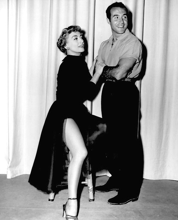 1953. On the set of 'Torch Song' with Ricardo Montalban.