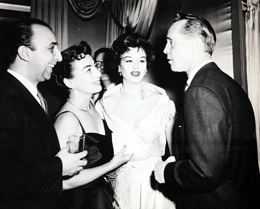 1953. At NYC's Harwyn Club with ex-husband Franchot Tone (right).