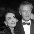 At the November 1953 premiere of 'Torch Song' with 'Johnny Guitar' director Nicholas Ray. (One large shot, and one smaller.)