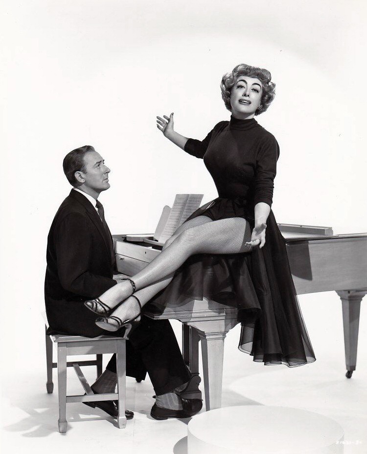 1953. 'Torch Song' publicity with Michael Wilding.