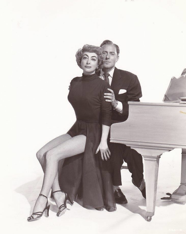 1953. 'Torch Song' publicity with Michael Wilding.