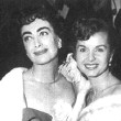 4/6/54. With Debbie Reynolds at unknown premiere.