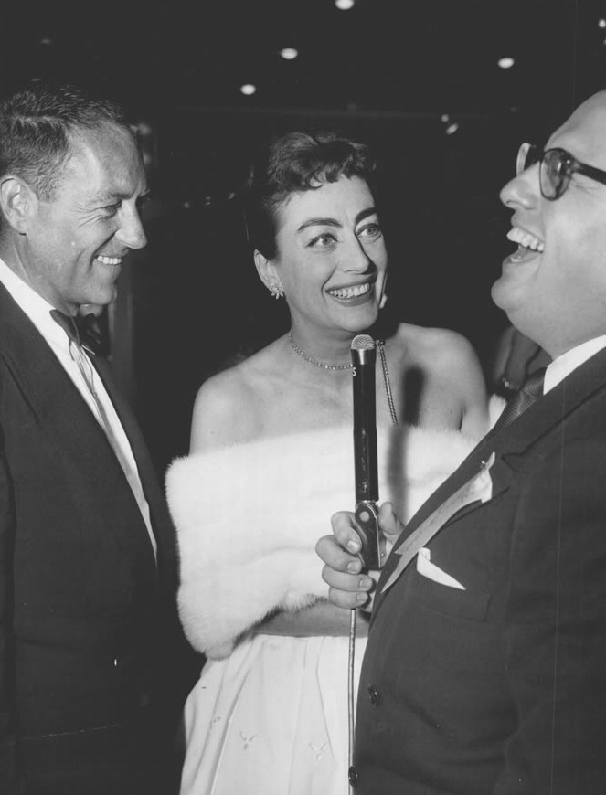 August 1954. With director Charles Walters, left, and Bud Widom.