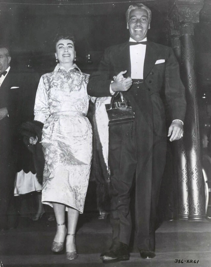 9/29/54. At the 'Star Is Born' after-party with Cesar Romero at the Cocoanut Grove.