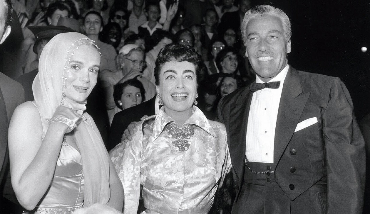 9/29/54 at the premiere of 'A Star Is Born' with Marie Wilson and Cesar Romero.