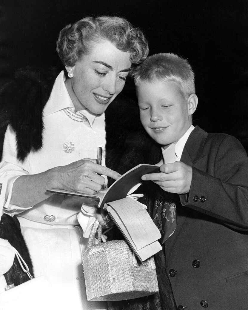 1952. At unknown event with son Christopher.