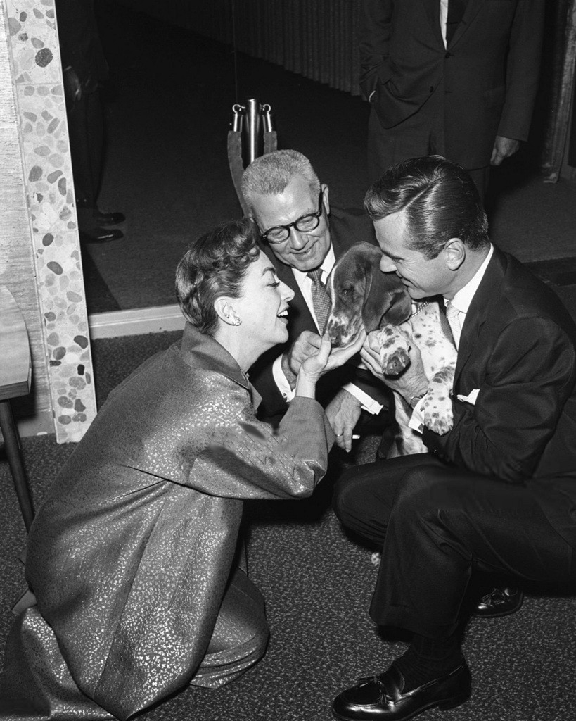 1955. At the premiere of NBC's 'The People's Choice,' with husband Al Steele, Jackie Cooper, and Bernadette the Basset Hound.
