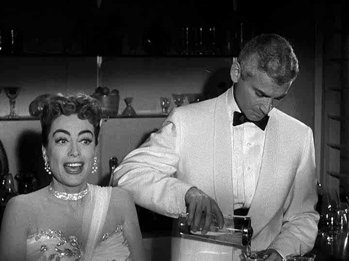 1955. 'Female on the Beach' screen shot with Jeff Chandler.