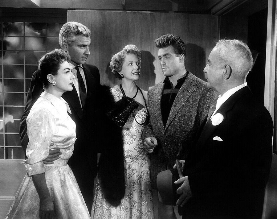 1955. 'Female on the Beach.' With Jeff Chandler, Natalie Schafer, Ed Fury, and Cecil Kellaway.