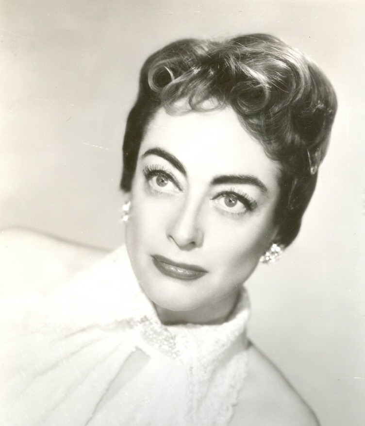 1955 publicity for 'Female on the Beach.'