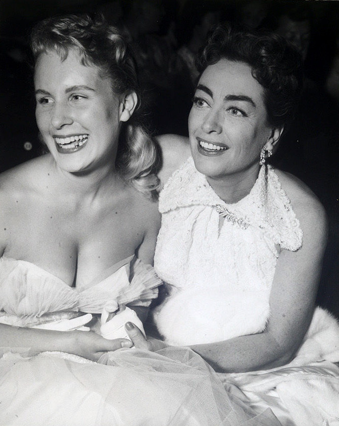 October 1955. At the Los Angeles Ice Follies with daughter Christina.
