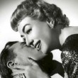 1955 'Queen Bee' publicity with John Ireland. Shot by Coburn.