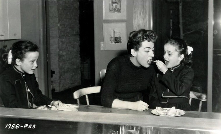 1/13/55. Twins' birthday on set of 'Female on the Beach.'