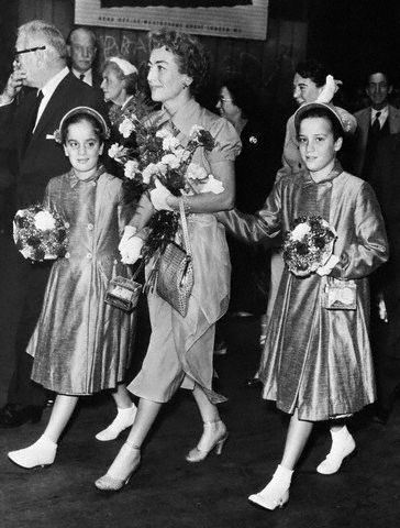 August 1956. Twins arrive in London.