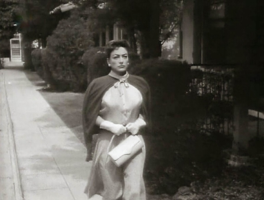 1956. Screen shot from 'Autumn Leaves.'