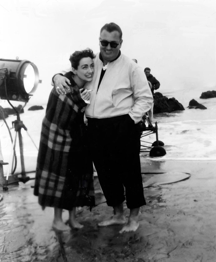 1956. On the set of 'Autumn Leaves' with director Robert Aldrich.