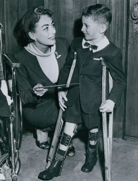 March 1956. At a fundraiser for the 'League in Aid of Crippled Children.'