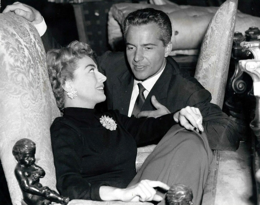 1957. On the set of 'Esther Costello' with Rossano Brazzi.