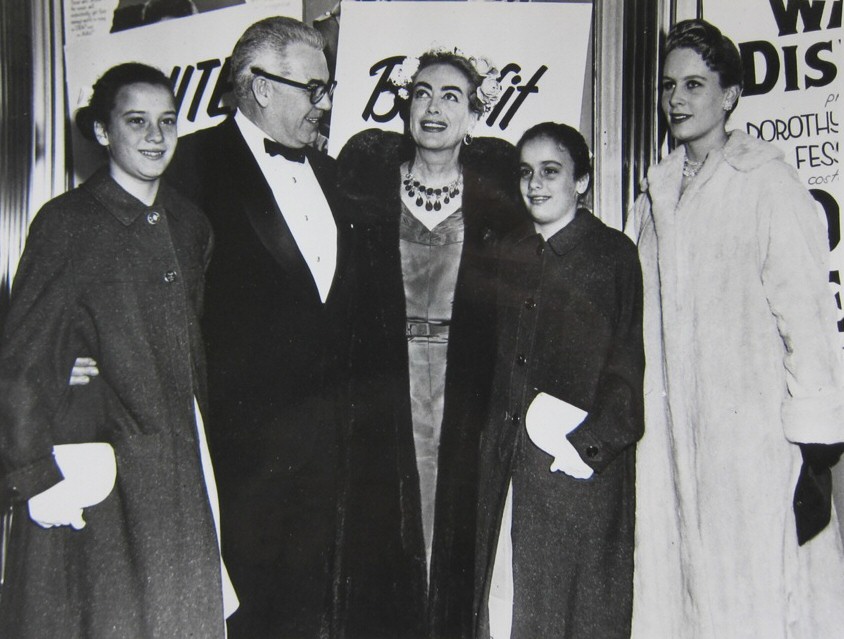 1957. With husband Al Steele and daughters.