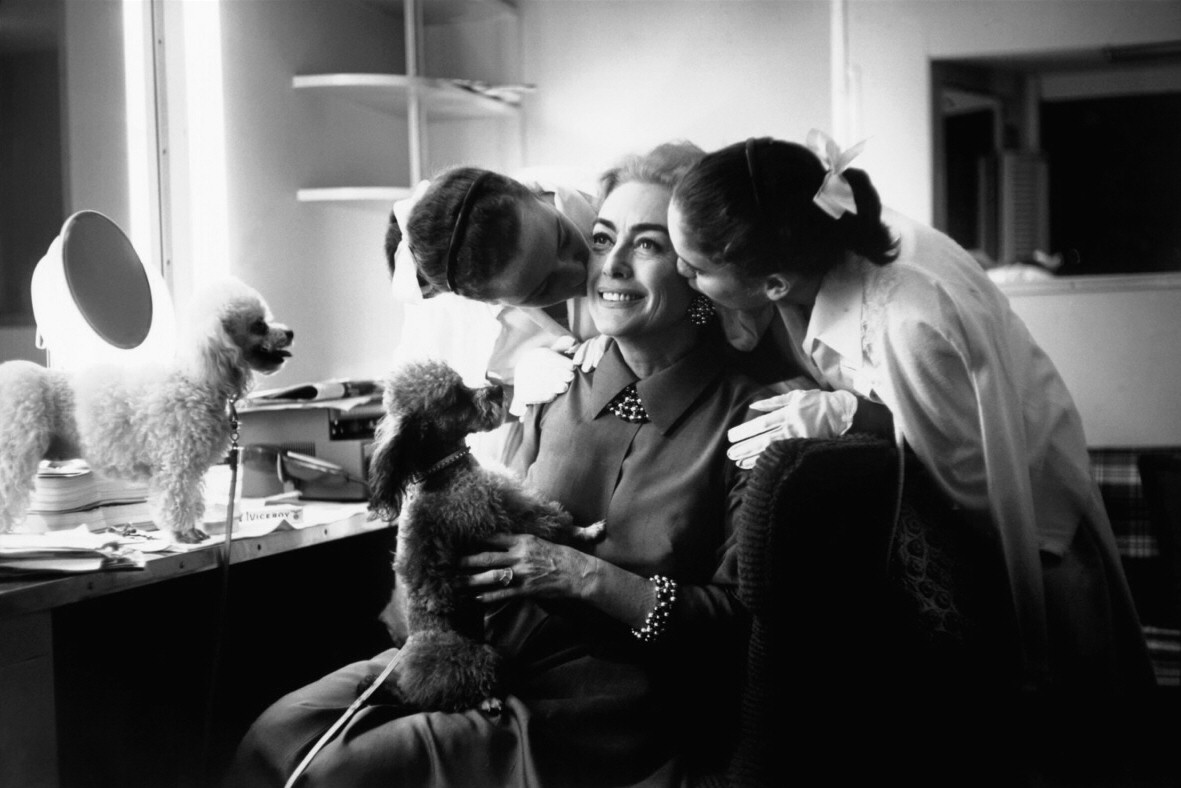 1959. On the set of 'The Best of Everything' with Twins and poodles. Shot by Eve Arnold.