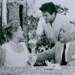 1959. At a 20th Century-Fox party with, left to right, producer Buddly Adler, actor Stuart Whitman, and 20th president Spyros Skouras. (Shot by Eve Arnold.)