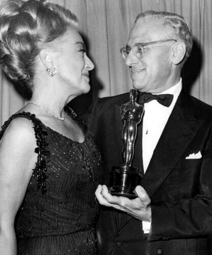 At the 4/5/65 Academy Awards with Best Director George Cukor.