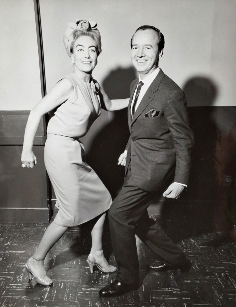 Circa 1962. With Earl Blackwell, practicing The Twist for an upcoming benefit.