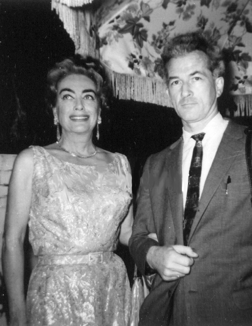 1961. At a Hollywood party in her honor with L. Allan Smith.