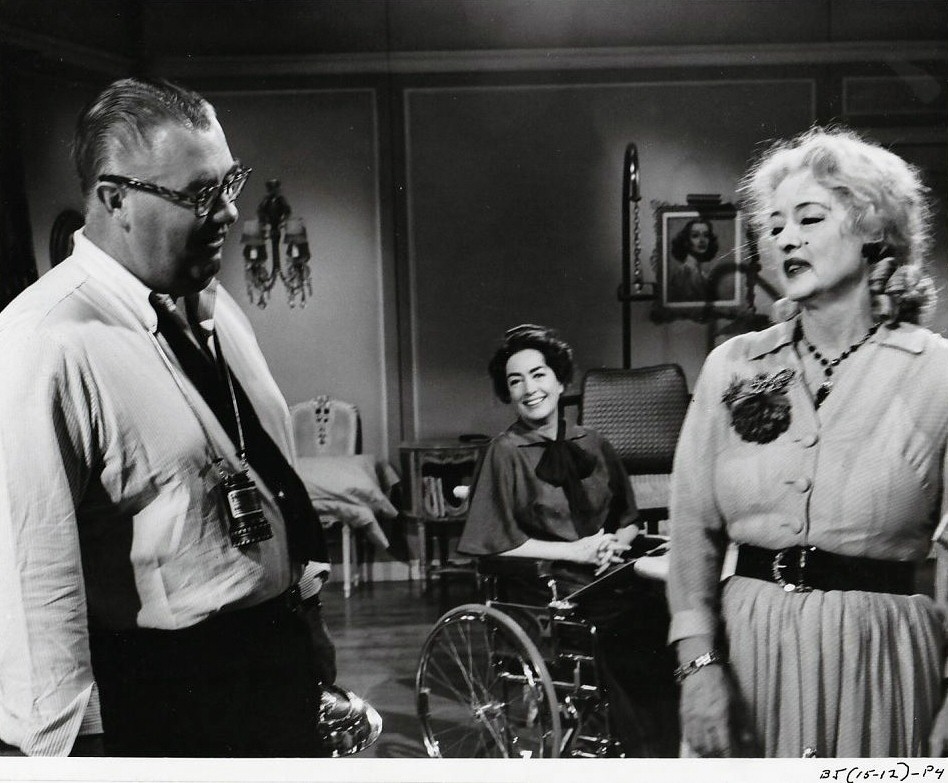 1962. On the set of 'Baby Jane' with director Aldrich and Bette Davis.