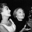 May 1963. Delivering the Oscar to Anne Bancroft on the set of 'Mother Courage.' 