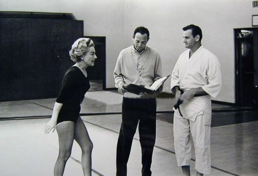 1962. On the set of 'The Caretakers,' with instructor Bruce Tegnor, right.