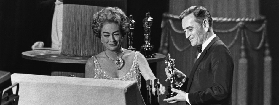 At the Oscars, April 8, 1963. Presenting the Best Director award to David Lean. (Thanks to Oliver Geiger.)