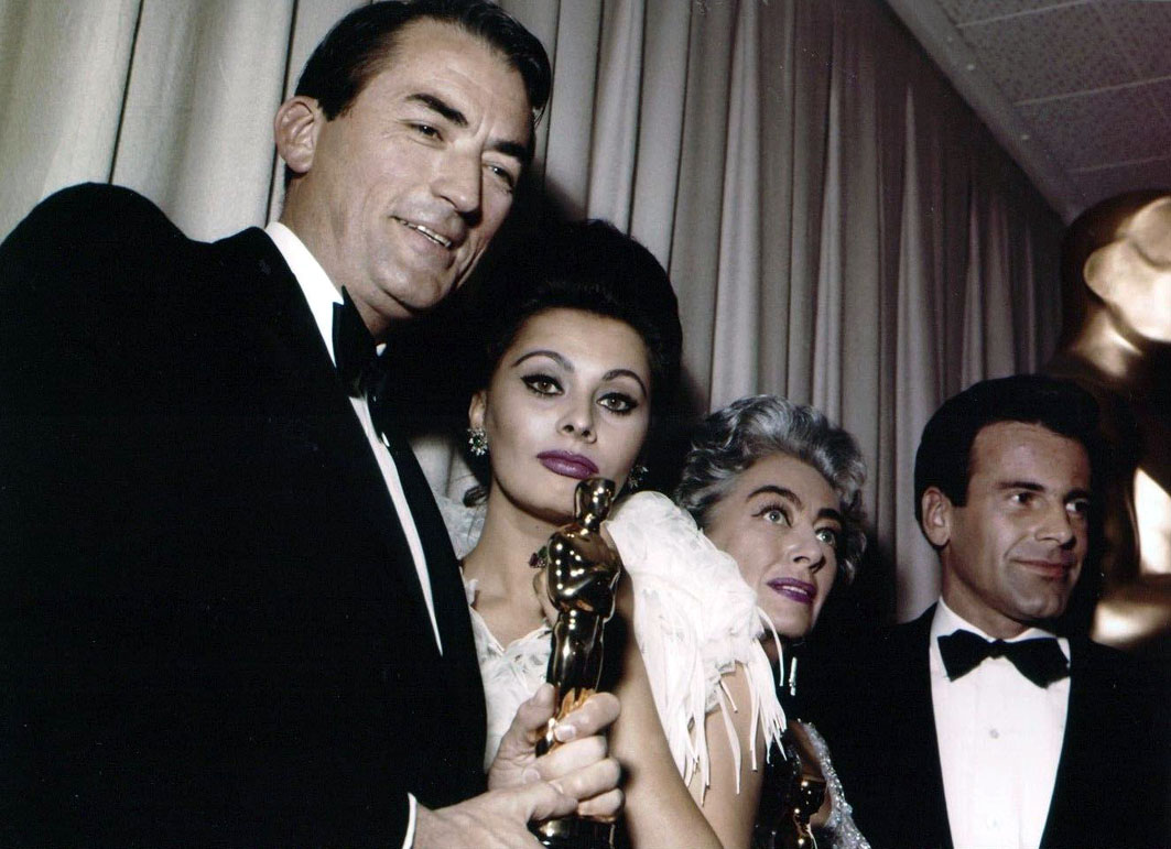 At the 4/8/63 Academy Awards with Gregory Peck, Sophia Loren, and Maximilian Schell.