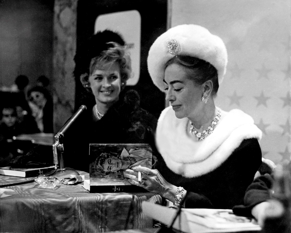 1962. 'Portrait of Joan' book signing.