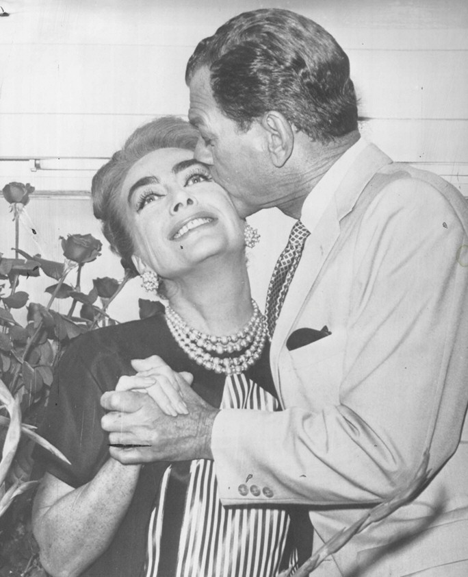 July 1964. Back on the 'Hush' set with Joseph Cotten, after her hospitalization.